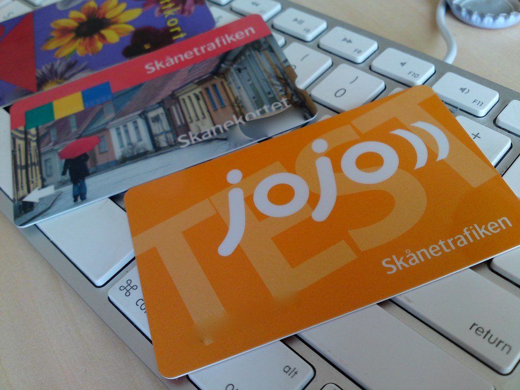 A contactless payment card being tapped on a reader