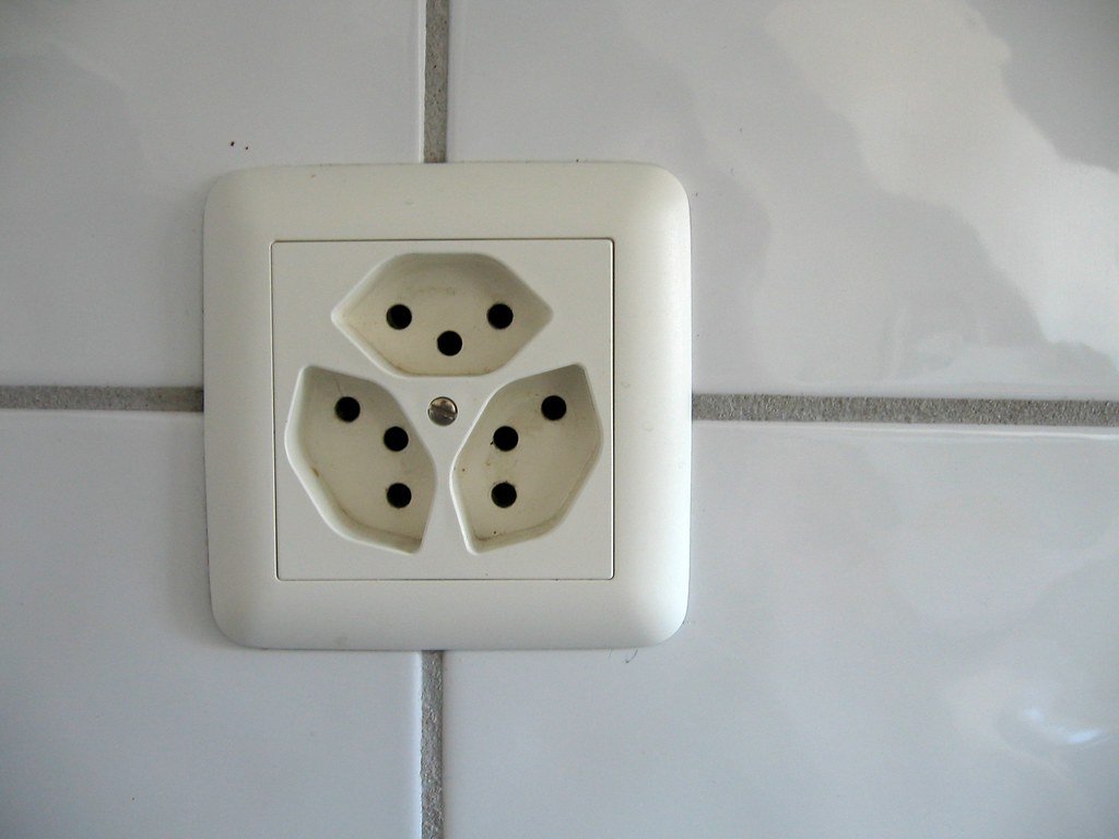 A wall of standard electrical sockets