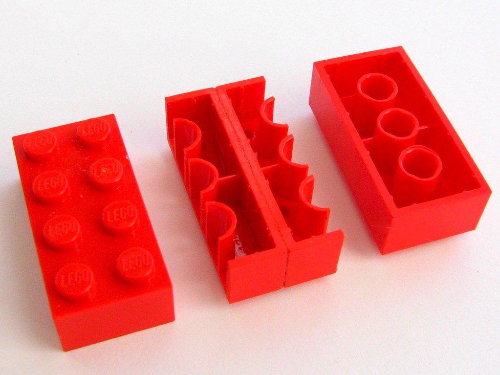 A single Lego brick, showing how modular pieces attach to a core