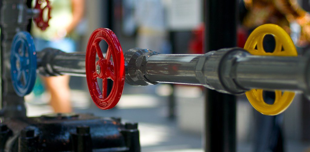 An industrial pipeline running across open ground